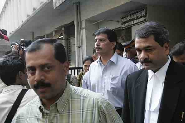 Police encounter specialists Sachin Vaze (left) and Pradeep Sharma. (Vikas Khot/Hindustan Times via Getty Images)